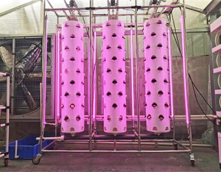 Rotating hydroponics tower system